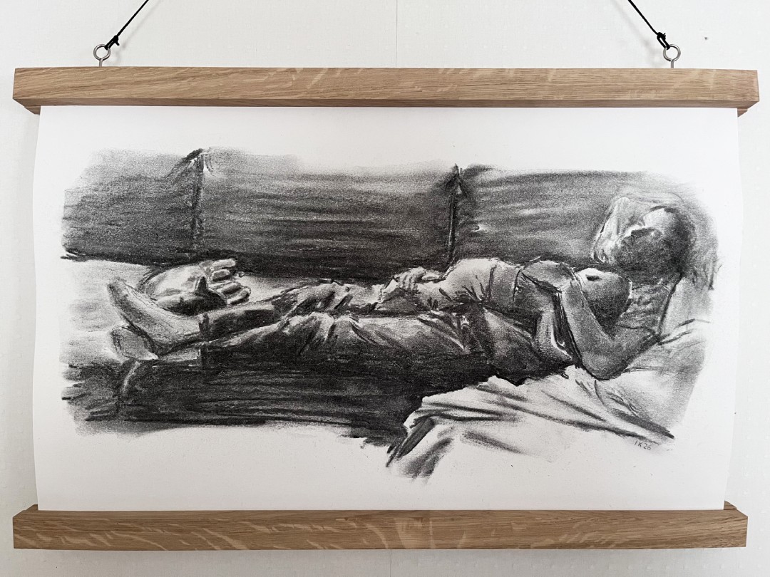 Charcoal drawing of a man napping on a couch with a baby and a cat